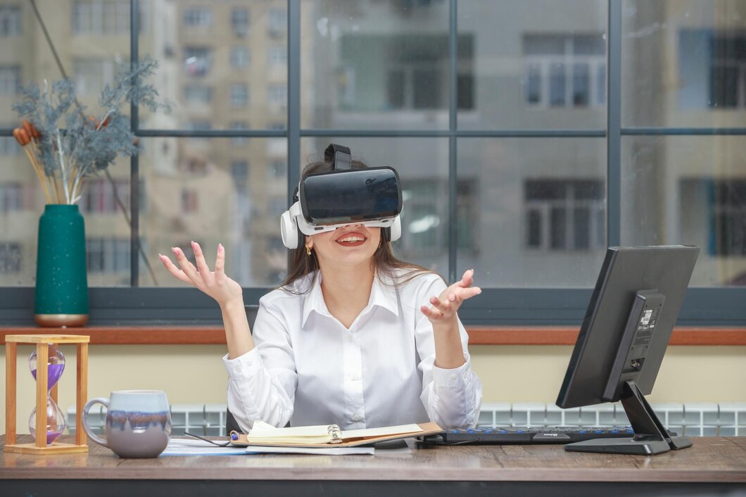 cheerful-young-girl-wearing-vr-glasses-smiling-desk_144627-77103